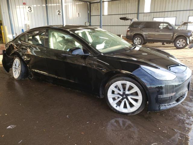 Photo 4 from auction – 2022 TESLA MODEL 3 with VIN 5YJ3E1EAXNF371181