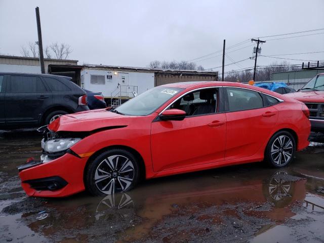 HONDA CIVIC EXL 2018 with VIN JHMFC1F76JX025195 - Photo from auction