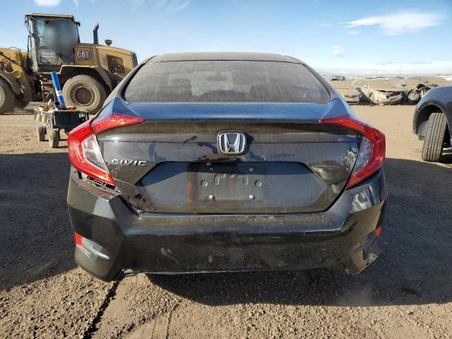 Photo 6 from auction – 2018 HONDA CIVIC LX with VIN 2HGFC2F54JH605993