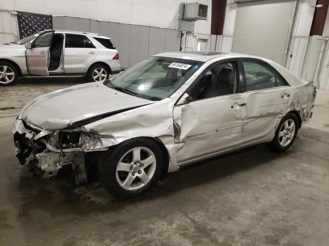 TOYOTA CAMRY LE 2003 with VIN 4T1BF30K83U561677 - Photo from auction