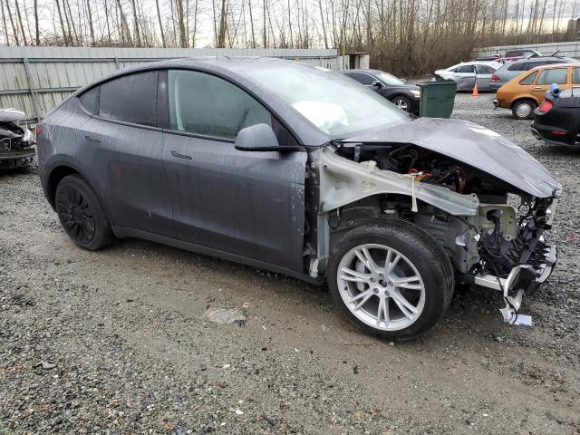 Снимка 4 от търг – 2023 TESLA MODEL Y с VIN 7SAYGDEE8PF927644