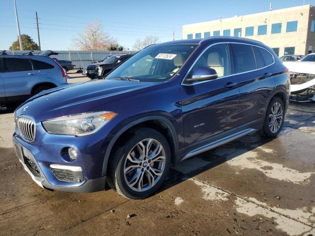 BMW X1 XDRIVE2 2016 with VIN WBXHT3C33GP885641 - Photo from auction