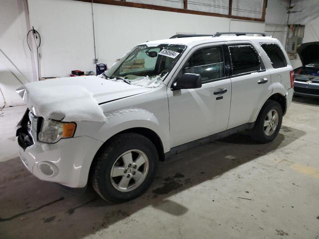 FORD ESCAPE XLT 2011 with VIN 1FMCU9DG4BKB74055 - Photo from auction