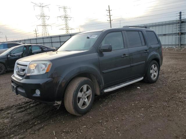 HONDA PILOT EXL 2011 with VIN 5FNYF4H52BB104194 - Photo from auction