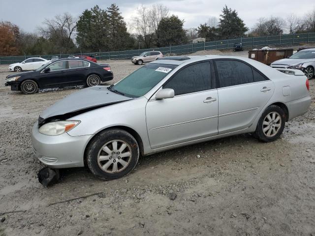 TOYOTA CAMRY LE 2002 with VIN 4T1BF30K72U529821 - Photo from auction