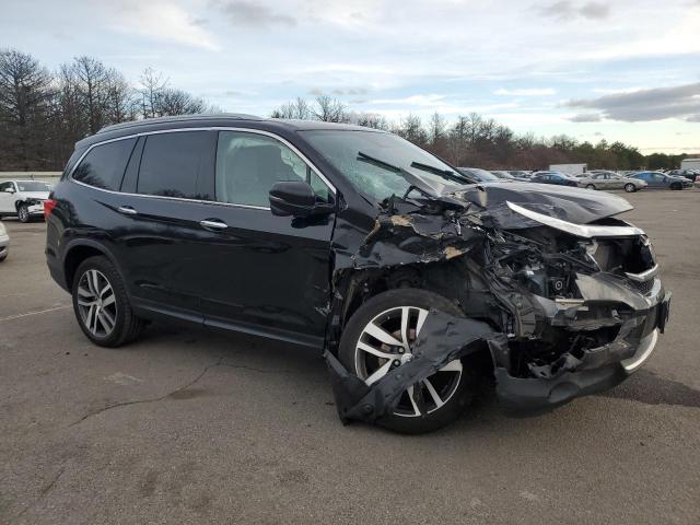 Photo 4 from auction – 2018 HONDA PILOT TOUR with VIN 5FNYF6H98JB070694