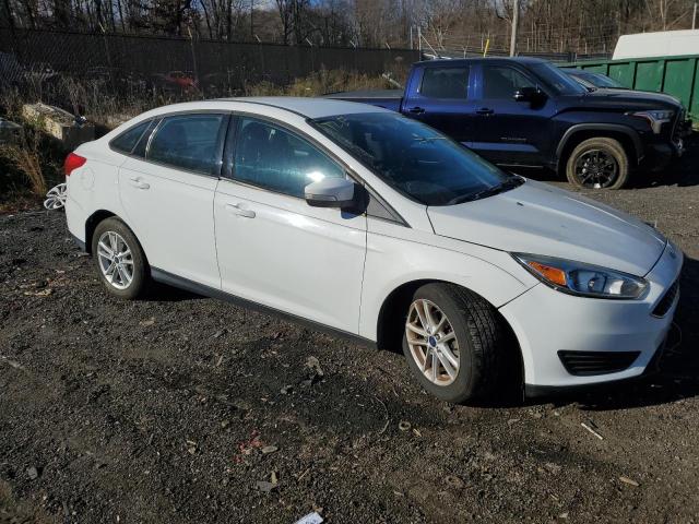 Photo 4 from auction – 2016 FORD FOCUS SE with VIN 1FADP3F22GL213389