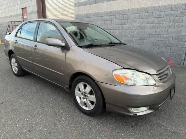 TOYOTA COROLLA CE 2004 with VIN 2T1BR32E34C218728 - Photo from auction