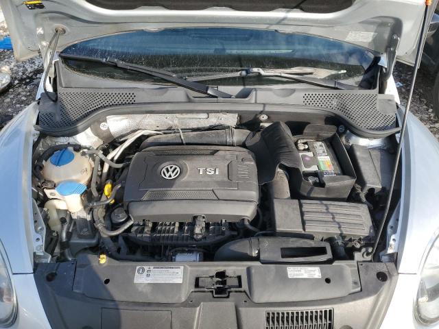 Photo 11 from auction – 2014 VOLKSWAGEN BEETLE with VIN 3VWF17AT4EM634714