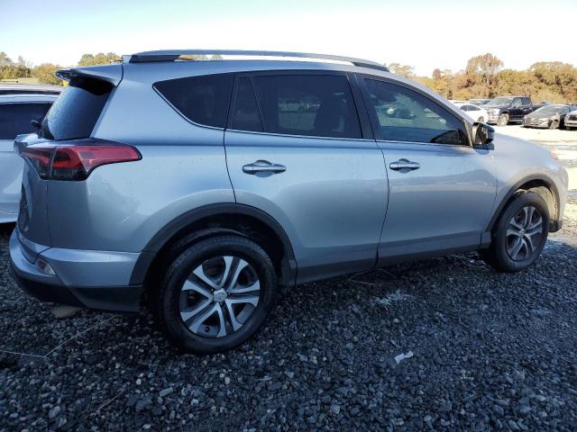 Photo 3 from auction – 2018 TOYOTA RAV4 LE with VIN 2T3ZFREV0JW424662