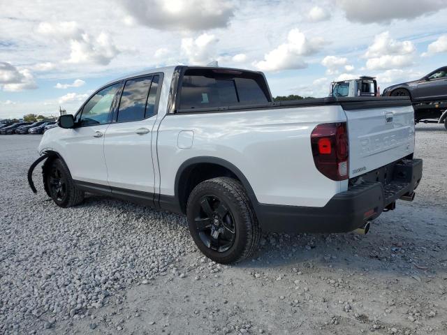 Photo 2 from auction – 2024 HONDA RIDGELINE with VIN 5FPYK3F86RB001669