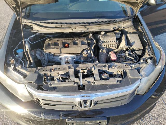 Photo 11 from auction – 2012 HONDA CIVIC LX with VIN 2HGFB2F58CH604903