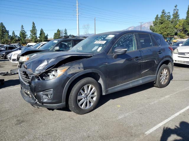 MAZDA CX-5 TOURI 2016 with VIN JM3KE2CY5G0743018 - Photo from auction