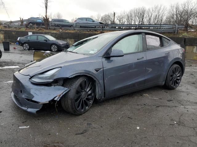 TESLA MODEL Y 2023 with VIN 7SAYGDEFXPF698487 - Photo from auction