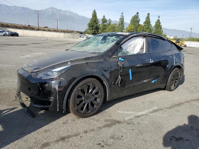 TESLA MODEL Y 2021 с VIN 5YJYGDED2MF124330 - Снимка от търг