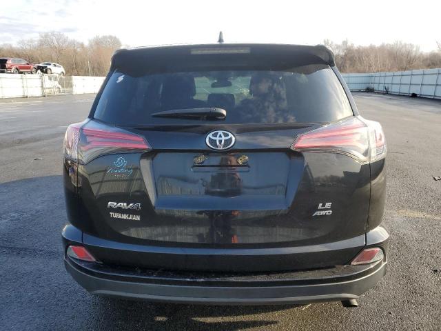 Photo 6 from auction – 2018 TOYOTA RAV4 LE with VIN 2T3BFREV8JW844087