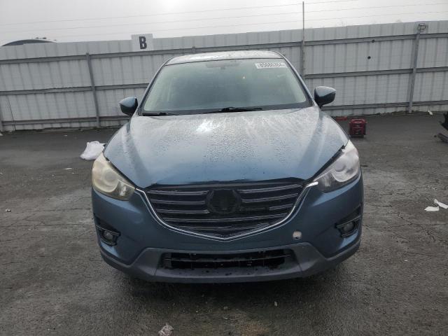 Photo 5 from auction – 2016 MAZDA CX-5 with VIN JM3KE2CY3G0646285