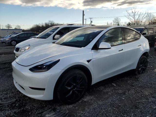 TESLA MODEL Y 2024 with VIN 7SAYGDEE0RA328625 - Photo from auction