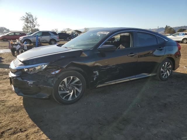 HONDA CIVIC EX 2018 with VIN 2HGFC2F70JH606303 - Photo from auction