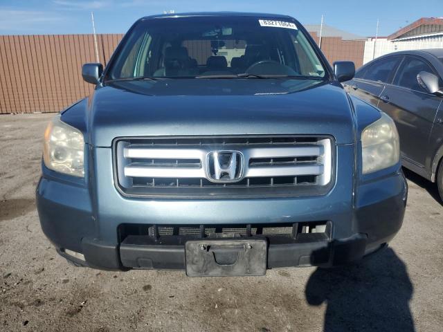 Photo 5 from auction – 2006 HONDA PILOT EX with VIN 2HKYF18546H565077