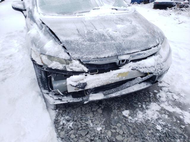 Photo 12 from auction – 2011 HONDA CIVIC DX-G with VIN 2HGFA1F44BH100982