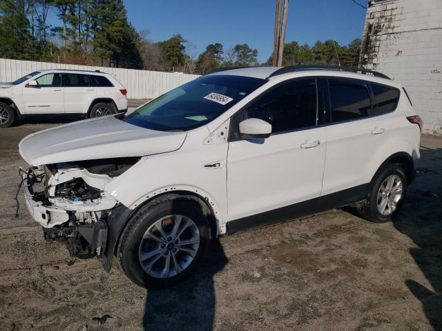 FORD ESCAPE SE 2018 with VIN 1FMCU9GD7JUA11811 - Photo from auction