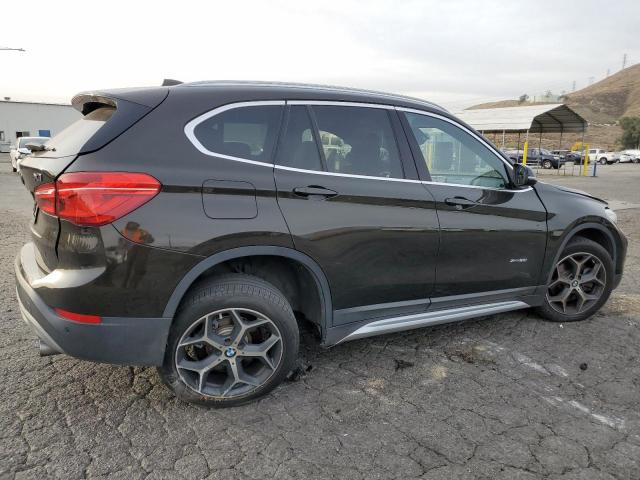 Photo 3 from auction – 2017 BMW X1 XDRIVE2 with VIN WBXHT3C35H5F71070