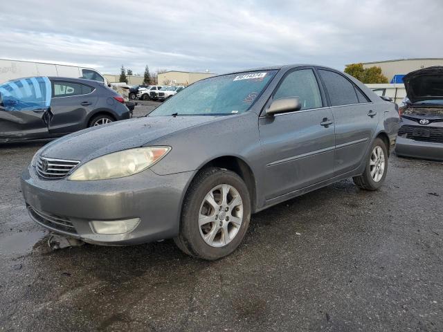TOYOTA CAMRY LE 2005 with VIN 4T1BF32K65U591051 - Photo from auction