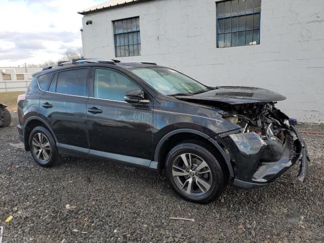 Photo 4 from auction – 2017 TOYOTA RAV4 XLE with VIN 2T3RFREVXHW607111