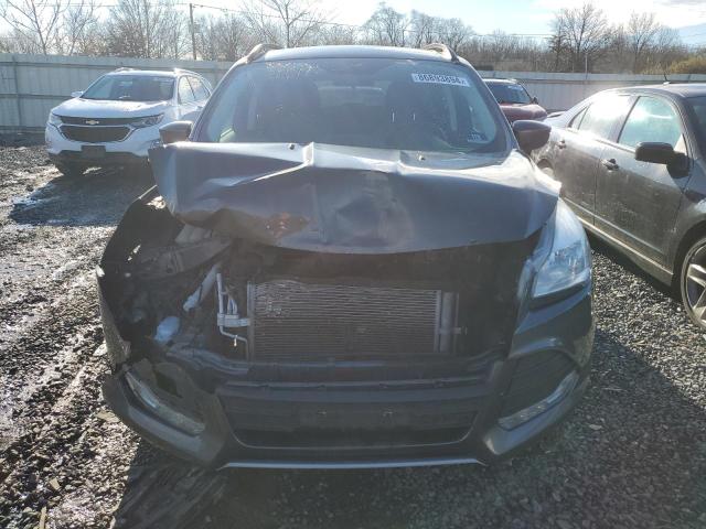 Photo 5 from auction – 2016 FORD ESCAPE SE with VIN 1FMCU9GX8GUA89694