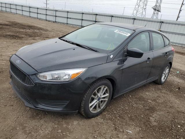 FORD FOCUS SE 2018 with VIN 1FADP3K22JL231579 - Photo from auction