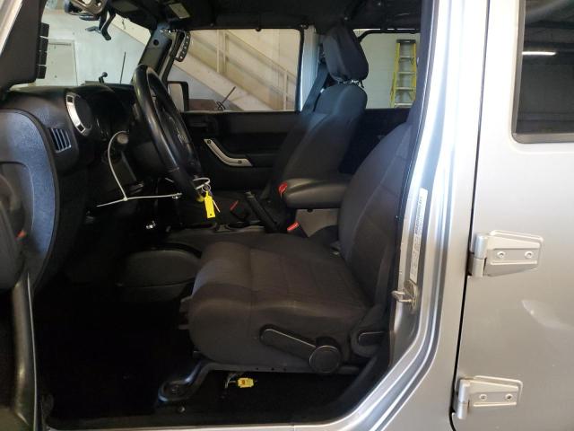 Photo 7 from auction – 2011 JEEP WRANGLER U with VIN 1J4HA5H12BL633055