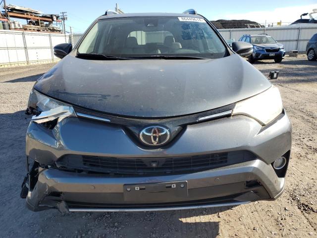 Photo 5 from auction – 2018 TOYOTA RAV4 LIMIT with VIN JTMYFREV5JD122003