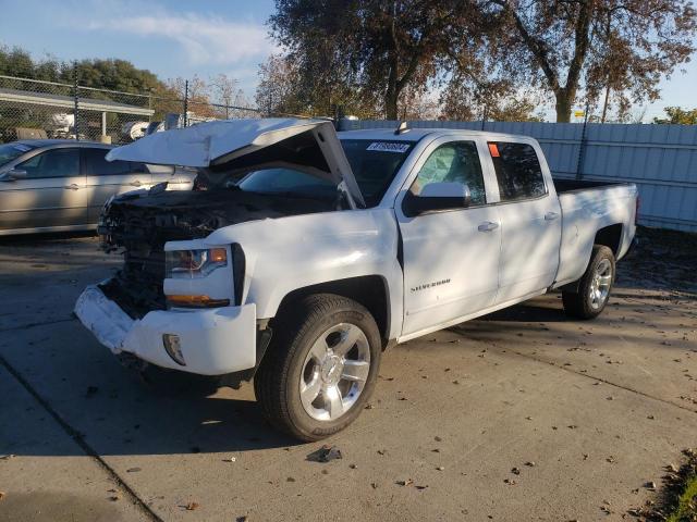 CHEVROLET SILVERADO 2018 with VIN 1GCUKREC4JF133409 - Photo from auction