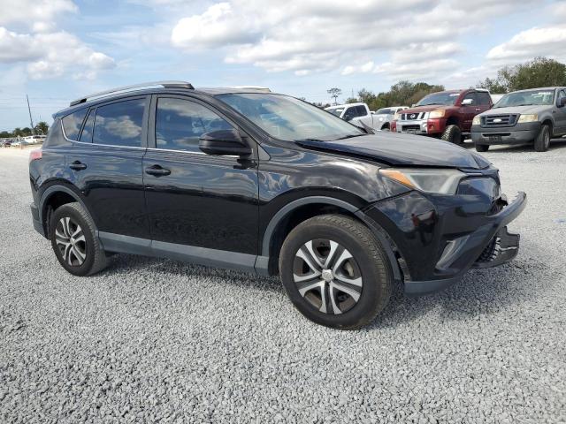 Photo 4 from auction – 2018 TOYOTA RAV4 LE with VIN 2T3ZFREV3JW422839