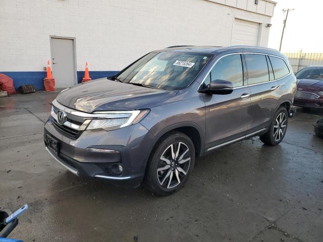 HONDA PILOT ELIT 2022 with VIN 5FNYF6H07NB006203 - Photo from auction