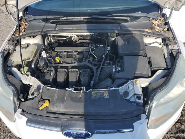 Photo 11 from auction – 2012 FORD FOCUS S with VIN 1FAHP3E22CL244607