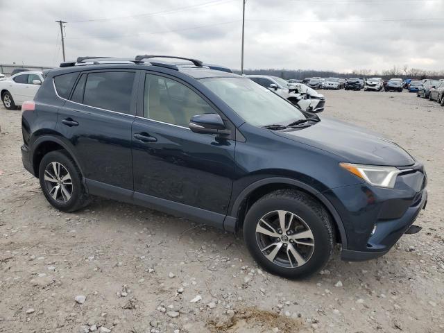 Photo 4 from auction – 2017 TOYOTA RAV4 XLE with VIN JTMWFREV0HD096203