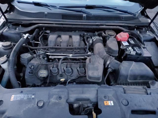 Photo 11 from auction – 2015 FORD TAURUS SEL with VIN 1FAHP2E86FG148152