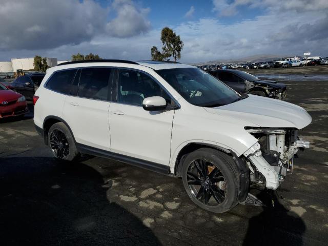 Photo 4 from auction – 2022 HONDA PILOT SE with VIN 5FNYF5H29NB005839
