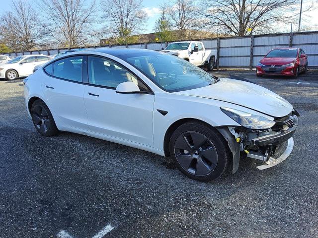 Photo 4 from auction – 2022 TESLA MODEL 3 with VIN 5YJ3E1EAXNF372220