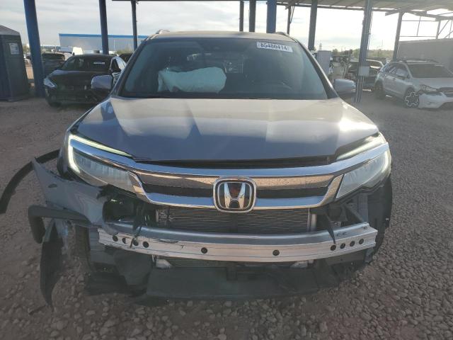 Photo 5 from auction – 2022 HONDA PILOT ELIT with VIN 5FNYF6H0XNB050938