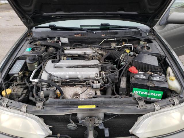 Photo 11 from auction – 2000 INFINITI G20 with VIN JNKCP11A5YT303404