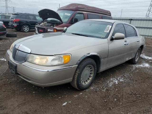 LINCOLN TOWN CAR E 2001 with VIN 1LNHM81W31Y733358 - Photo from auction