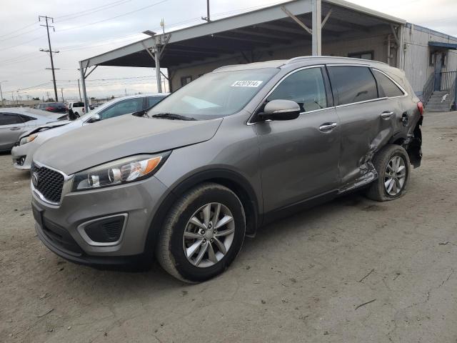 KIA SORENTO LX 2016 with VIN 5XYPG4A56GG072000 - Photo from auction