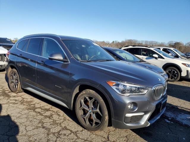Photo 4 from auction – 2016 BMW X1 XDRIVE2 with VIN WBXHT3C36G5E50191