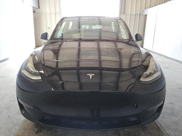 Photo 5 from auction – 2022 TESLA MODEL Y with VIN 7SAYGDEE7NF481712