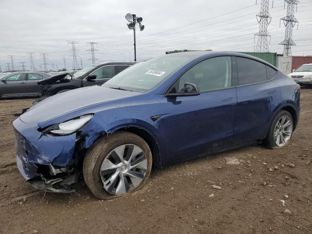 TESLA MODEL Y 2023 with VIN 7SAYGDEE7PF703927 - Photo from auction
