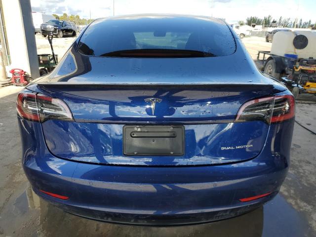 Photo 6 from auction – 2022 TESLA MODEL 3 with VIN 5YJ3E1EB4NF114686