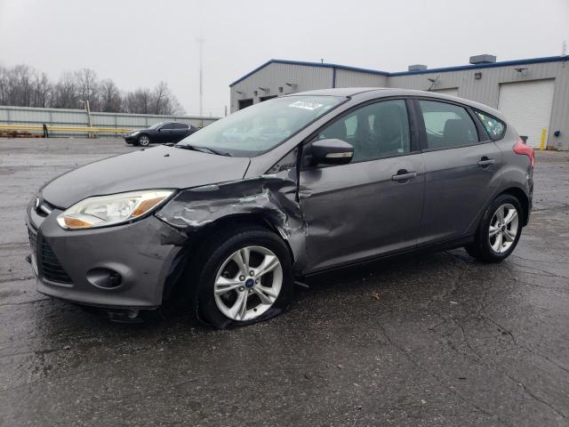 FORD FOCUS SE 2014 with VIN 1FADP3K26EL407412 - Photo from auction